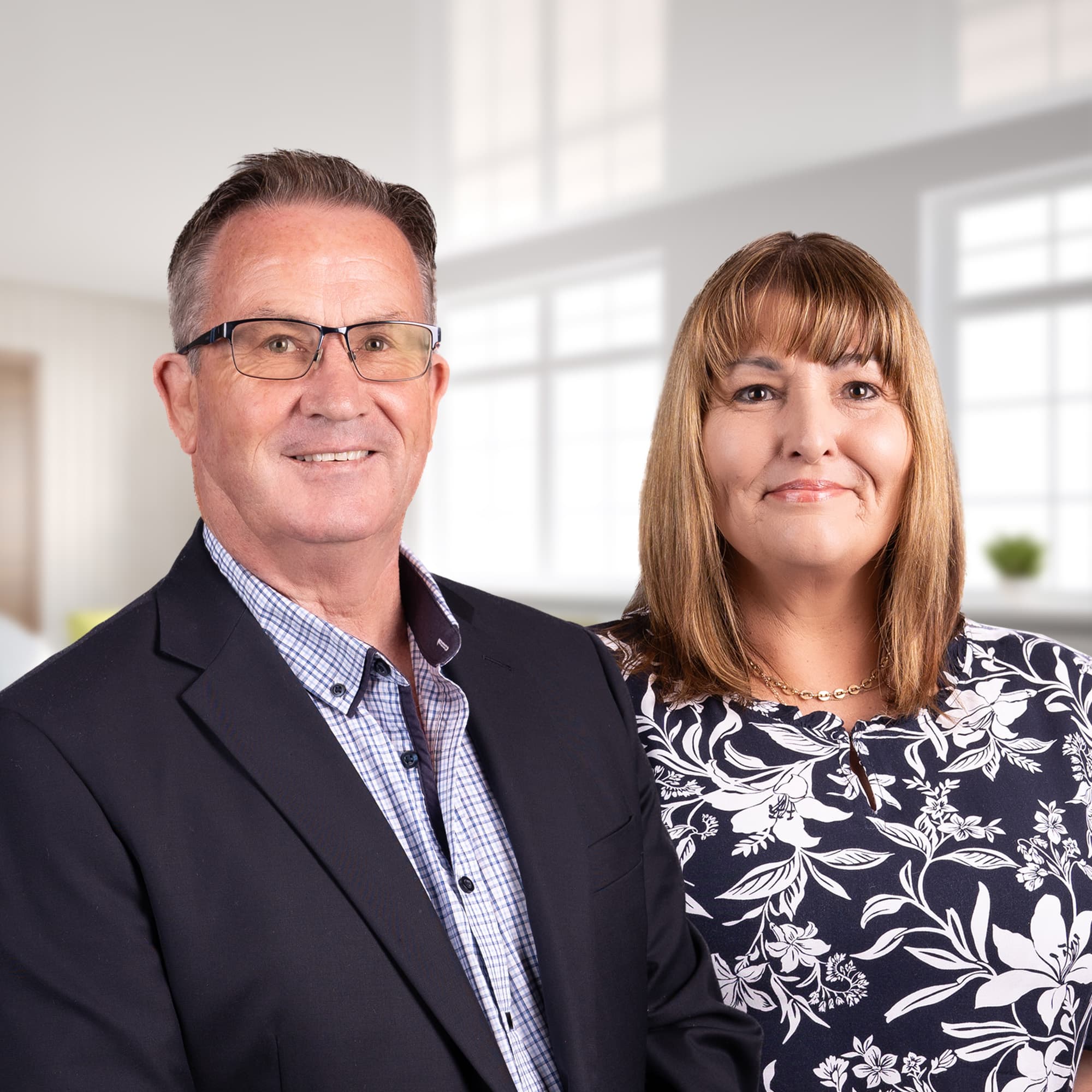 Allan and Karen Toner, husband-and-wife real estate agents in Palmerston North